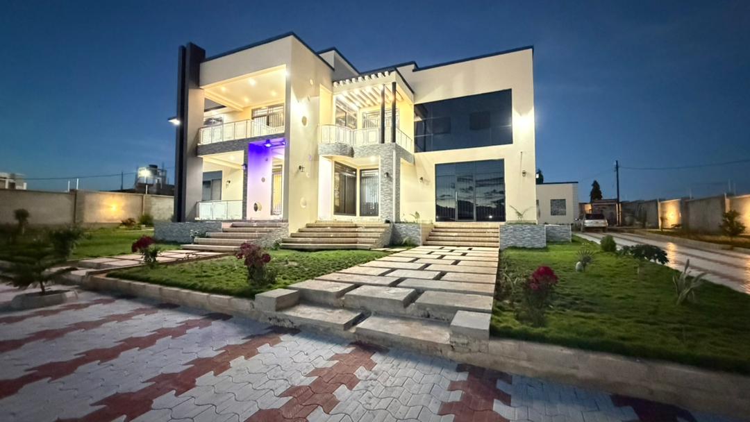 A newly built two storey mansion available for sale — CK ESTATES DODOMA COMPANY LIMITED